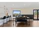 Eat-in kitchen area with table, chairs, and large window overlooking the deck at 7575 E Windlawn Way, Parker, CO 80134
