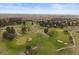 Beautiful aerial view of the lush green golf course and surrounding community at 7575 E Windlawn Way, Parker, CO 80134