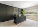 Home office with desk, statement wall, and a large window at 7575 E Windlawn Way, Parker, CO 80134