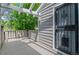 Deck with pergola, door and railing that offers views of the surrounding yard at 3871 E Euclid Ave, Centennial, CO 80121