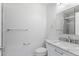 Clean bathroom featuring a vanity with a marble countertop and shower with glass doors at 3871 E Euclid Ave, Centennial, CO 80121