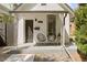 Charming front porch with seating and address marker at 825 S Grant St, Denver, CO 80209