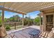 This spacious back deck with a pergola is perfect for outdoor relaxation and entertaining at 23426 Briar Leaf Ave, Parker, CO 80138