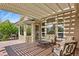 Inviting back deck with a pergola, offering shaded seating and an outdoor living space at 23426 Briar Leaf Ave, Parker, CO 80138