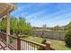 A well-maintained backyard featuring green grass, flowerbeds, and a wooden fence for privacy at 23426 Briar Leaf Ave, Parker, CO 80138