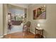 Elegant entryway featuring hardwood floors and views into the living room at 23426 Briar Leaf Ave, Parker, CO 80138