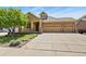 Charming two-story home with manicured lawn and spacious three car garage at 23426 Briar Leaf Ave, Parker, CO 80138