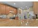 Kitchen featuring granite countertops, modern appliances, and ample cabinet space at 23426 Briar Leaf Ave, Parker, CO 80138