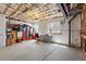 Unfinished basement features ample storage, bright windows, and exposed ceiling at 408 Sylvestor Trl, Highlands Ranch, CO 80129