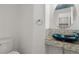 Modern bathroom features a vessel sink, mosaic tile, and stylish design at 408 Sylvestor Trl, Highlands Ranch, CO 80129