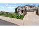Attractive two-story home with neat lawn and great views of the adjacent open space at 408 Sylvestor Trl, Highlands Ranch, CO 80129