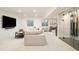 Finished basement with entertainment area, play area, and glass enclosed wine cellar at 350 Adams St, Denver, CO 80206