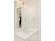 Elegant bathroom with a marble countertop, modern fixtures, and plenty of storage space at 350 Adams St, Denver, CO 80206