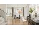 Open-concept dining room with glass doors and stylish decor at 350 Adams St, Denver, CO 80206