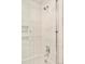 Clean and contemporary shower with marble tiling and a glass enclosure at 350 Adams St, Denver, CO 80206