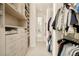 Spacious walk-in closet with custom shelving, drawers, and clothing racks at 350 Adams St, Denver, CO 80206