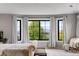 Bedroom with a scenic view of trees and mountains at 1311 Fletcher Dr, Erie, CO 80516