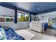 Adorable bedroom featuring light blue walls and a star-themed ceiling for a whimsical touch at 1311 Fletcher Dr, Erie, CO 80516