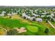 This community features lush green fairways and well maintained homes at 31 Shetland Ct, Highlands Ranch, CO 80130