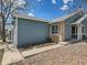 A charming home featuring beautiful stone accents and a well-maintained walkway, enhancing curb appeal at 31 Shetland Ct, Highlands Ranch, CO 80130