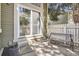 Cozy back patio with sliding glass door and space to relax outside at 14076 E Radcliff Cir, Aurora, CO 80015