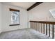 This bedroom features plush carpet and a window providing great natural light at 14076 E Radcliff Cir, Aurora, CO 80015