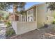 Charming home with an attractive exterior, complemented by a white picket fence and lovely landscaping at 14076 E Radcliff Cir, Aurora, CO 80015