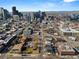 Sweeping aerial view of Denver's downtown skyline and surrounding neighborhoods on a clear day at 2451 Lawrence St # 2, Denver, CO 80205