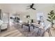 Bright living room features an open-concept design and natural light with hardwood floors at 4874 S Lincoln St, Englewood, CO 80113
