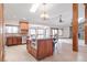 Bright and spacious kitchen with stainless steel appliances, center island, and an open layout at 103 Red Wing Ct, Mead, CO 80542