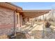 Covered patio offering ample seating and outdoor dining space at 103 Red Wing Ct, Mead, CO 80542