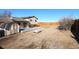 Large backyard features a shed, deck, and new fencing at 1104 S Biscay St, Aurora, CO 80017