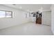 Basement with multiple windows for natural light in a home with renovated features at 1104 S Biscay St, Aurora, CO 80017