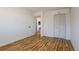 Bright bedroom with wood floors near the ensuite bathroom at 1104 S Biscay St, Aurora, CO 80017