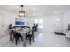 Bright dining room with a modern table set, comfortable seating, and stylish decor at 1104 S Biscay St, Aurora, CO 80017
