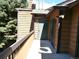 Exterior balcony offers privacy and a view of the surrounding area and mature trees at 2215 S Buckley Rd # 201, Aurora, CO 80013