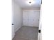 Bedroom features neutral walls, plush gray carpet, closet with sliding doors and a ceiling light at 2215 S Buckley Rd # 201, Aurora, CO 80013