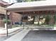 Community carport with covered parking and mature trees in the background at 2215 S Buckley Rd # 201, Aurora, CO 80013