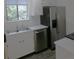 Updated kitchen featuring a stainless steel refrigerator and dishwasher at 2215 S Buckley Rd # 201, Aurora, CO 80013