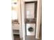 Convenient laundry area with stacked washer and dryer at 2215 S Buckley Rd # 201, Aurora, CO 80013