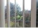 View through window of trees and green space at 2215 S Buckley Rd # 201, Aurora, CO 80013