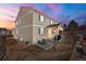 Beautiful home exterior featuring a landscaped backyard with a patio and lawn at 21028 E Saratoga Ave, Aurora, CO 80015