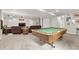 Entertainment basement with a pool table, comfortable seating area, and a TV at 21028 E Saratoga Ave, Aurora, CO 80015