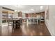 Spacious kitchen with stainless steel appliances and breakfast bar at 21028 E Saratoga Ave, Aurora, CO 80015