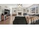 Cozy living room with fireplace, hardwood floors, and natural light at 21028 E Saratoga Ave, Aurora, CO 80015