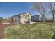 Spacious backyard featuring a well-maintained lawn and patio area for outdoor enjoyment at 4708 Rock Pipit Ct, Highlands Ranch, CO 80126