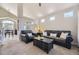 Cozy living room boasts modern decor, comfortable seating, and ample natural light at 4708 Rock Pipit Ct, Highlands Ranch, CO 80126