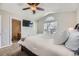 The main bedroom boasts an en-suite bathroom and TV at 4708 Rock Pipit Ct, Highlands Ranch, CO 80126
