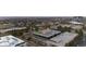 Aerial view of an suburban commercial building with a green roof and a large parking lot at 5700 S Quebec St # A, Englewood, CO 80111