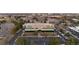 Aerial view of a commercial building with ample parking and landscaping in an urban area at 5700 S Quebec St # A, Englewood, CO 80111